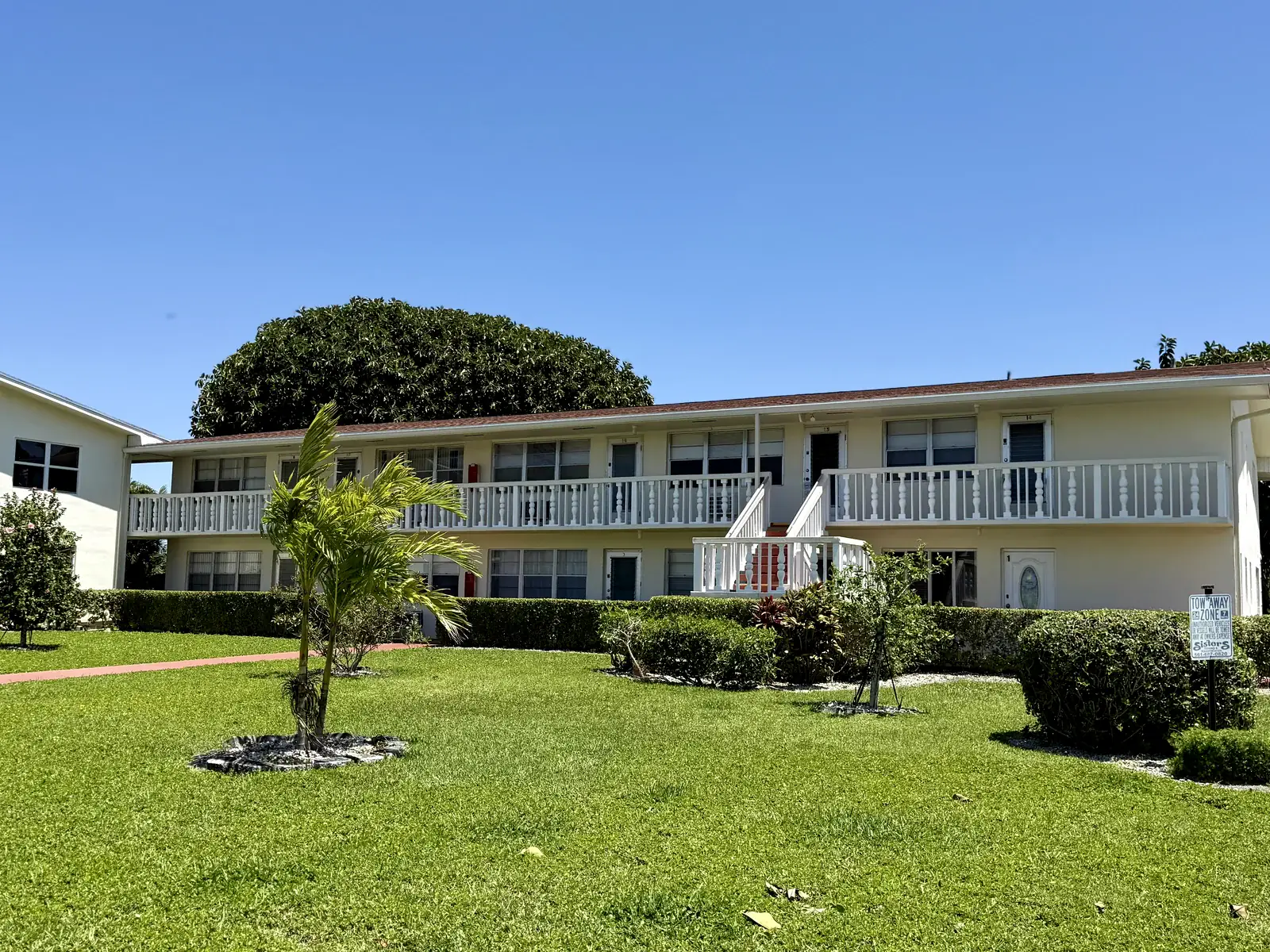 Century Village building courtyard and landscaped grounds